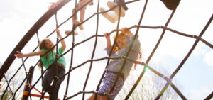 Peter Wachowski Child Care Negligence Lawsuits image. Photo of children playing on a jungle gym.