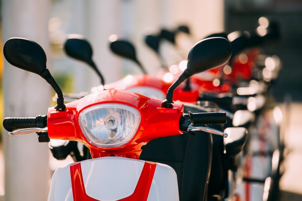 Micromobility & Personal Injury Law blog. Image of a row of parked ebikes.